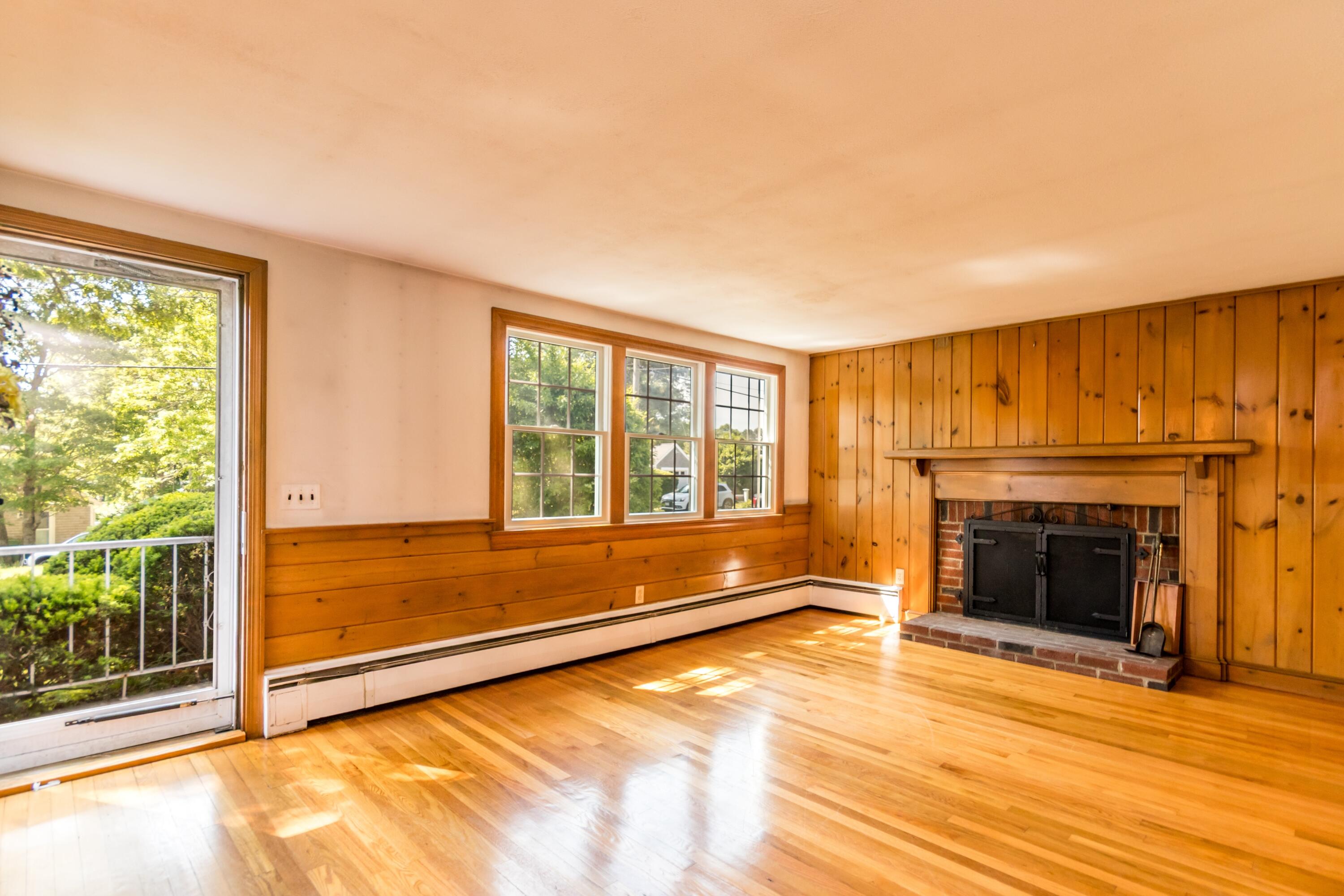 14 Ahab Road Yarmouth Port, MA 02675 - Photo 12 of 36 a view of an empty room with wooden floor and a window
