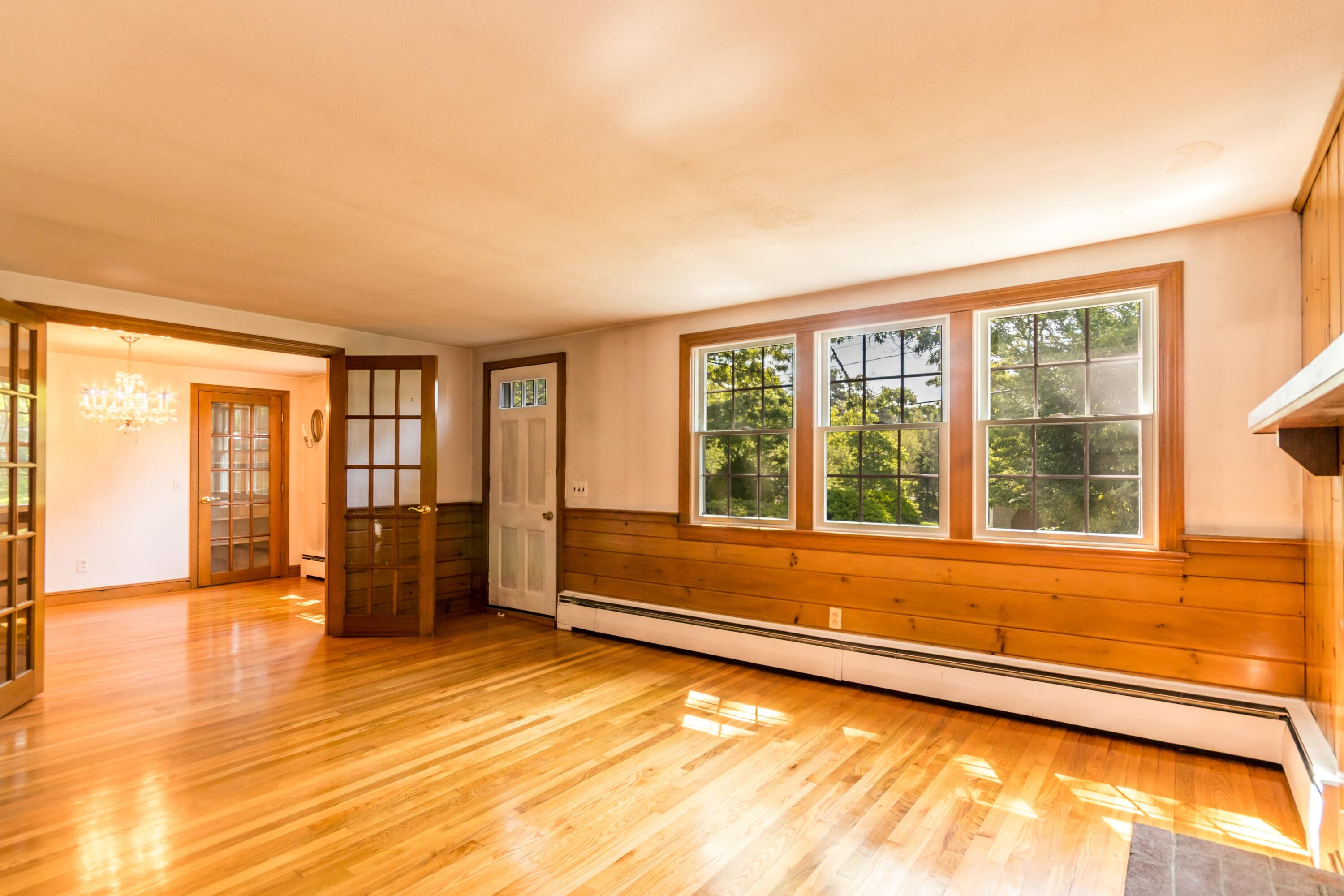 14 Ahab Road Yarmouth Port, MA 02675 - Photo 15 of 36 a view of an empty room with wooden floor and a window