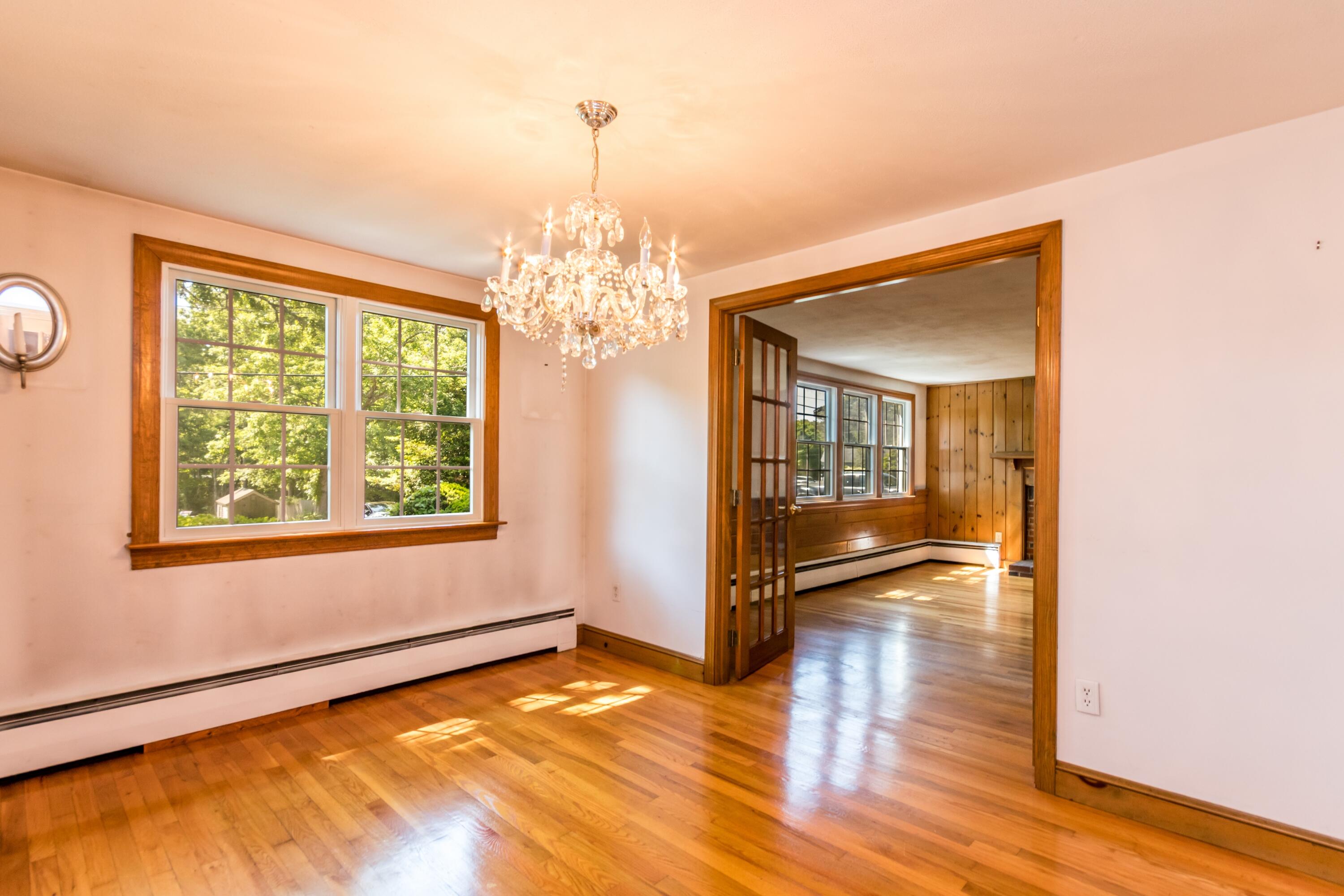 14 Ahab Road Yarmouth Port, MA 02675 - Photo 18 of 36 a view of an empty room with wooden floor and a window