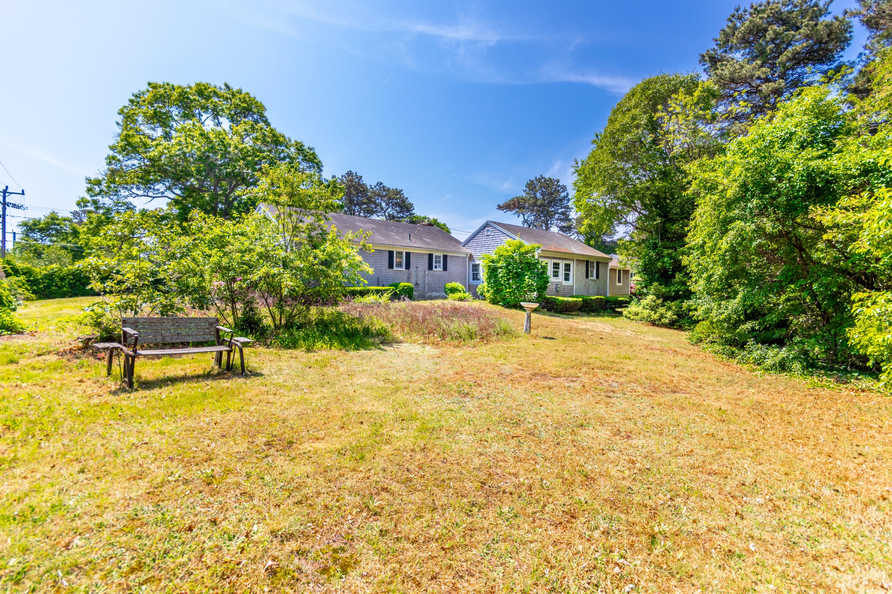 14 Ahab Road Yarmouth Port, MA 02675 - Photo 28 of 36 a swimming pool with outdoor seating and yard