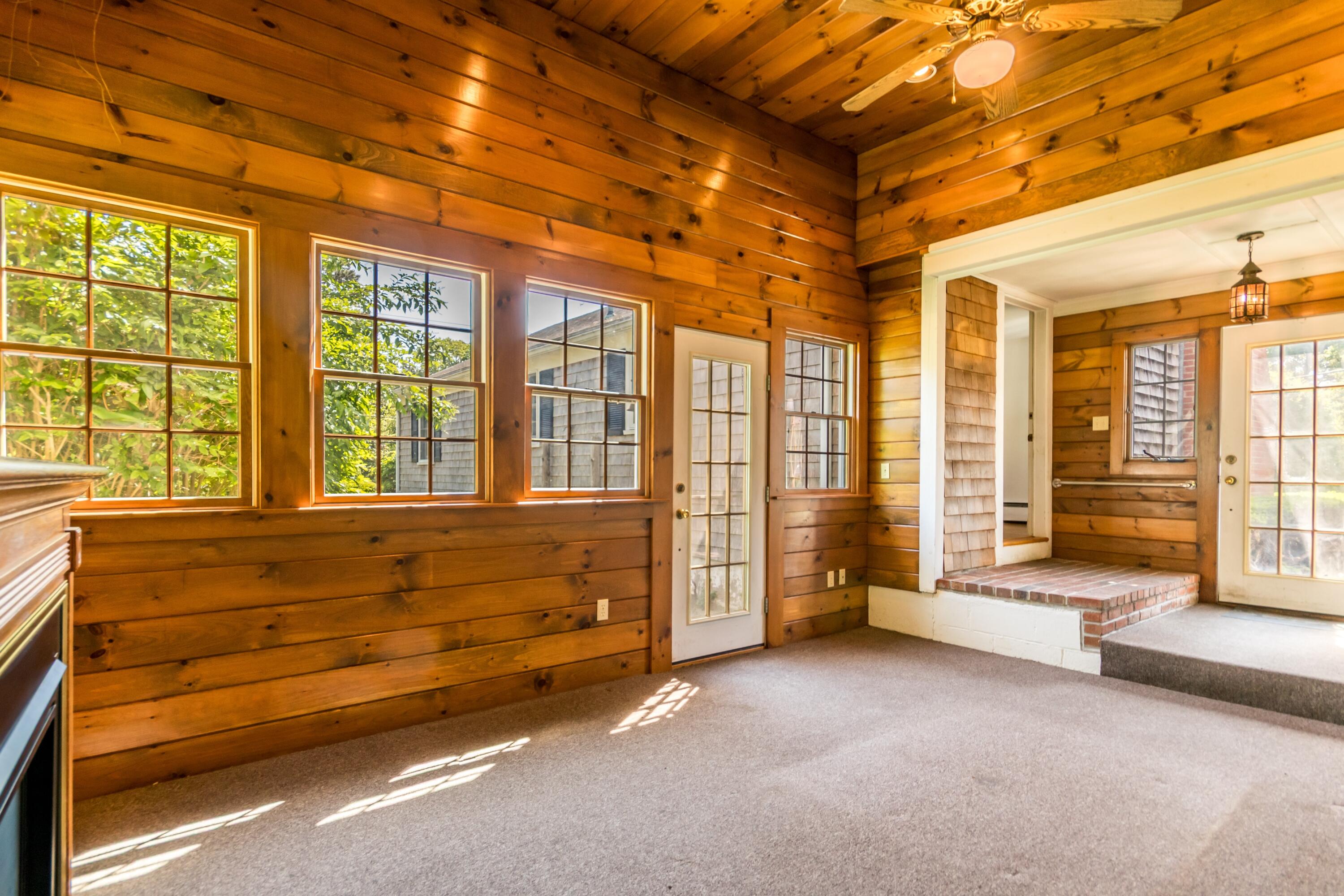 14 Ahab Road Yarmouth Port, MA 02675 - Photo 7 of 36 a living room with large windows