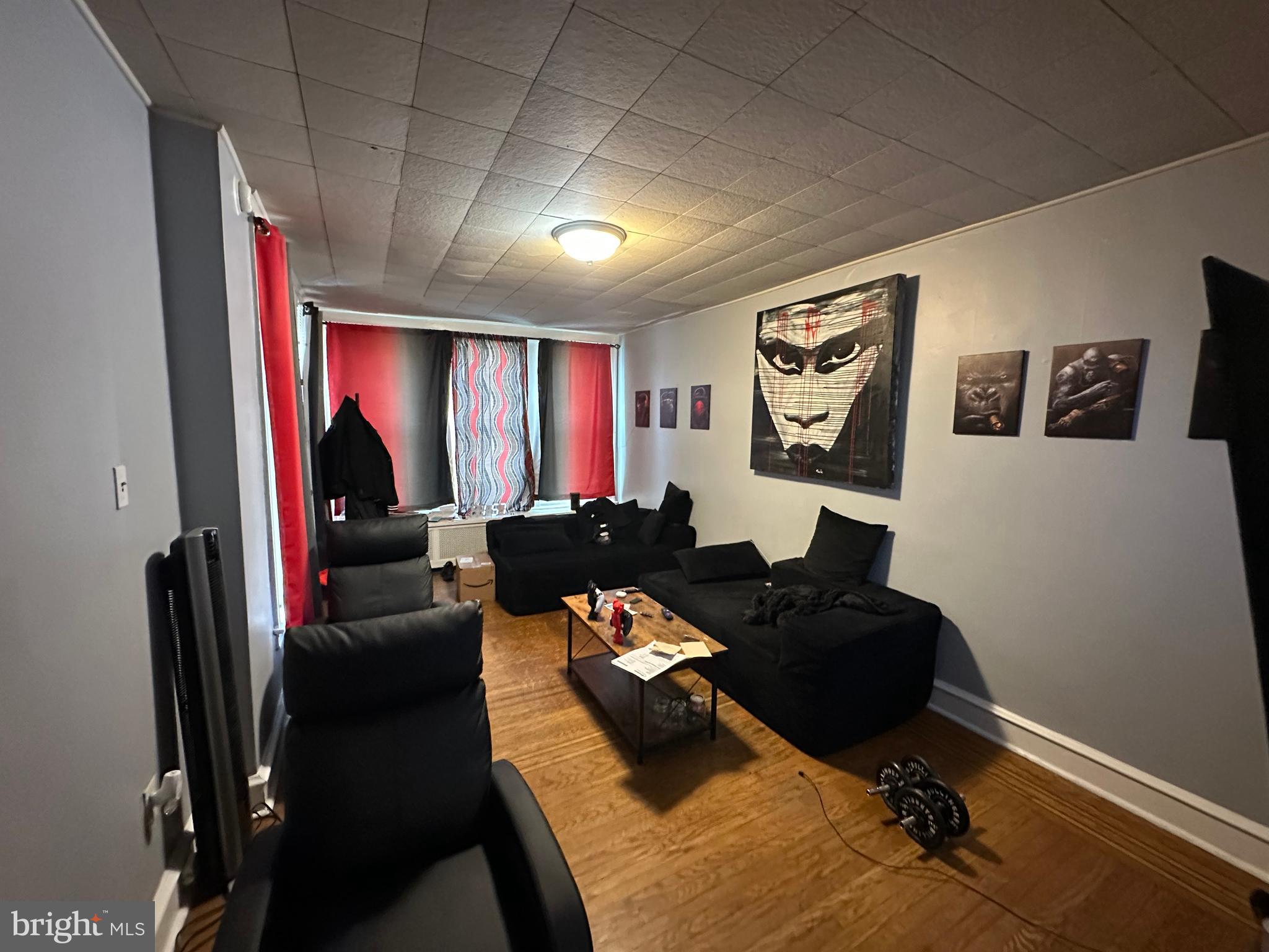 5039 F Street Philadelphia, PA 19124 - Photo 13 of 14 a living room with furniture