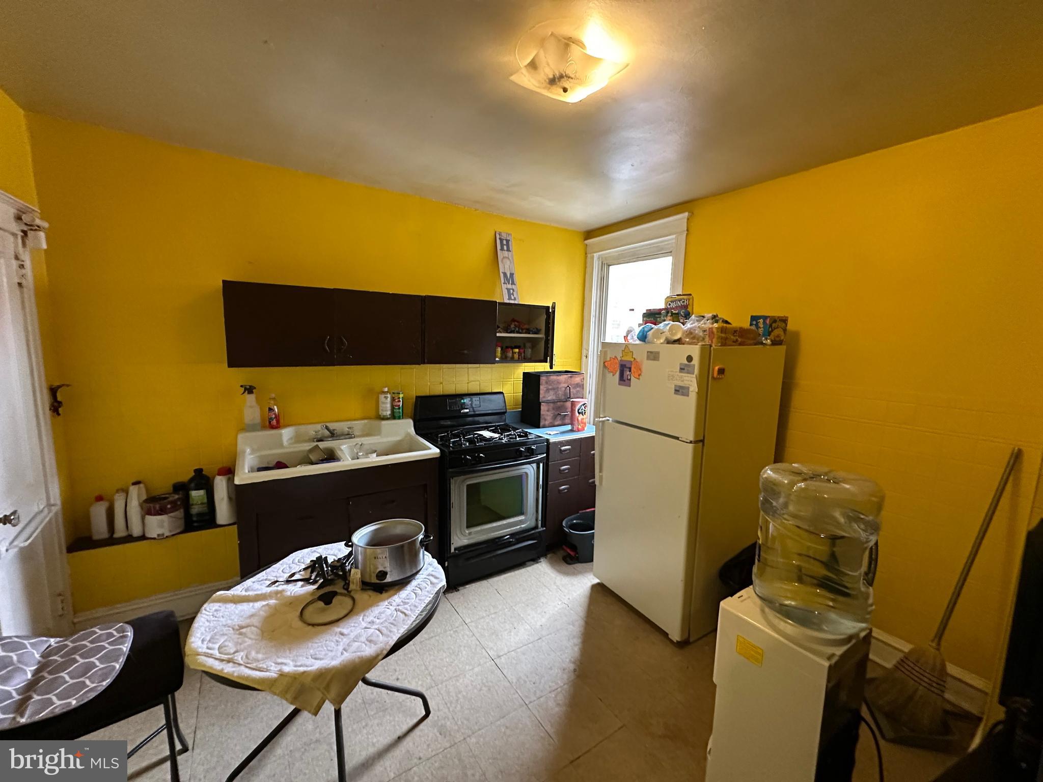 5039 F Street Philadelphia, PA 19124 - Photo 3 of 14 a kitchen with a sink appliances and cabinets