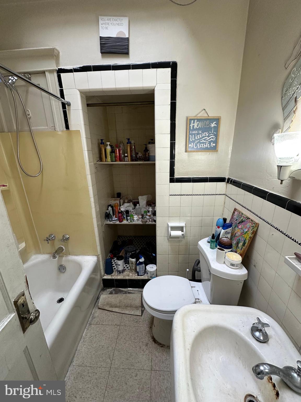 5039 F Street Philadelphia, PA 19124 - Photo 4 of 14 a bathroom with a sink mirror vanity and toilet