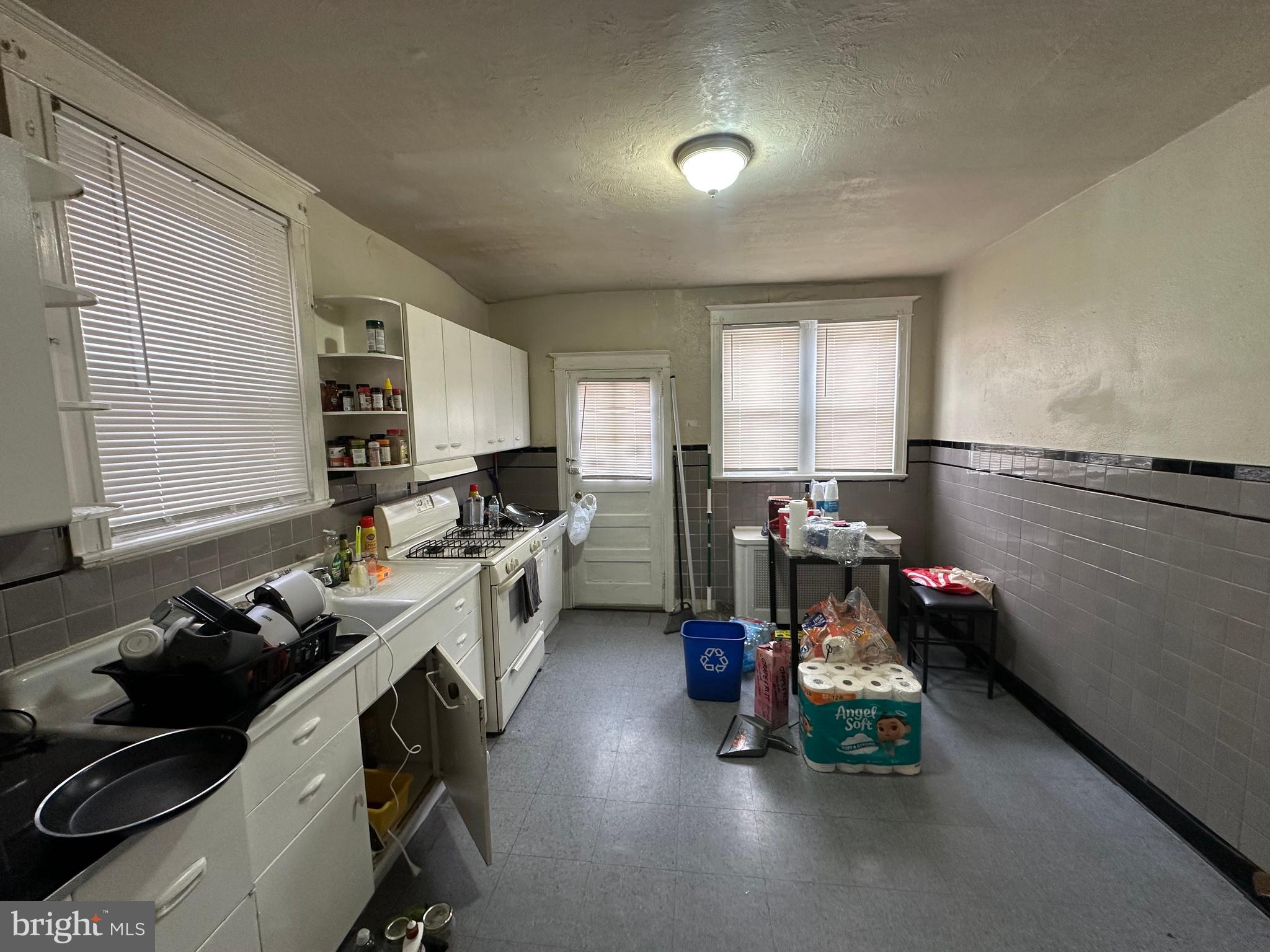 5039 F Street Philadelphia, PA 19124 - Photo 10 of 14 a kitchen with a sink appliances and cabinets