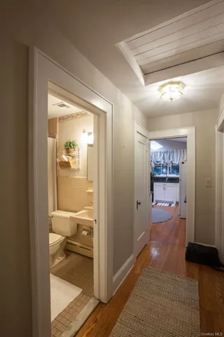 a room with furniture and wooden floor