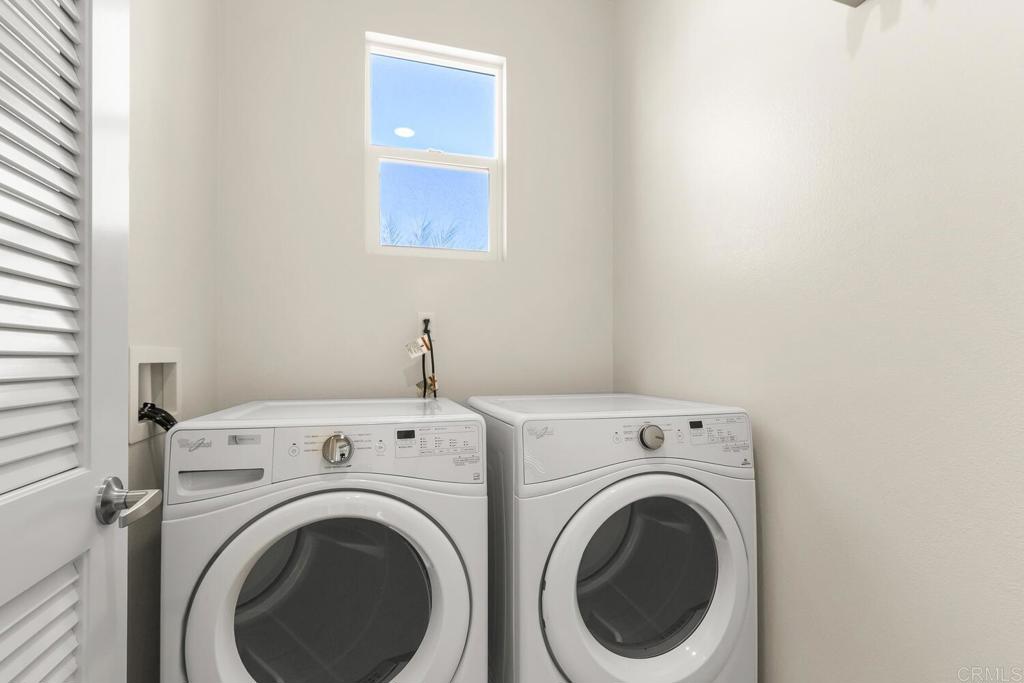 2012 Foxtrot Loop, Unit 3 Chula Vista, CA 91915 - Photo 15 of 34 a view of a hallway with washer and dryer