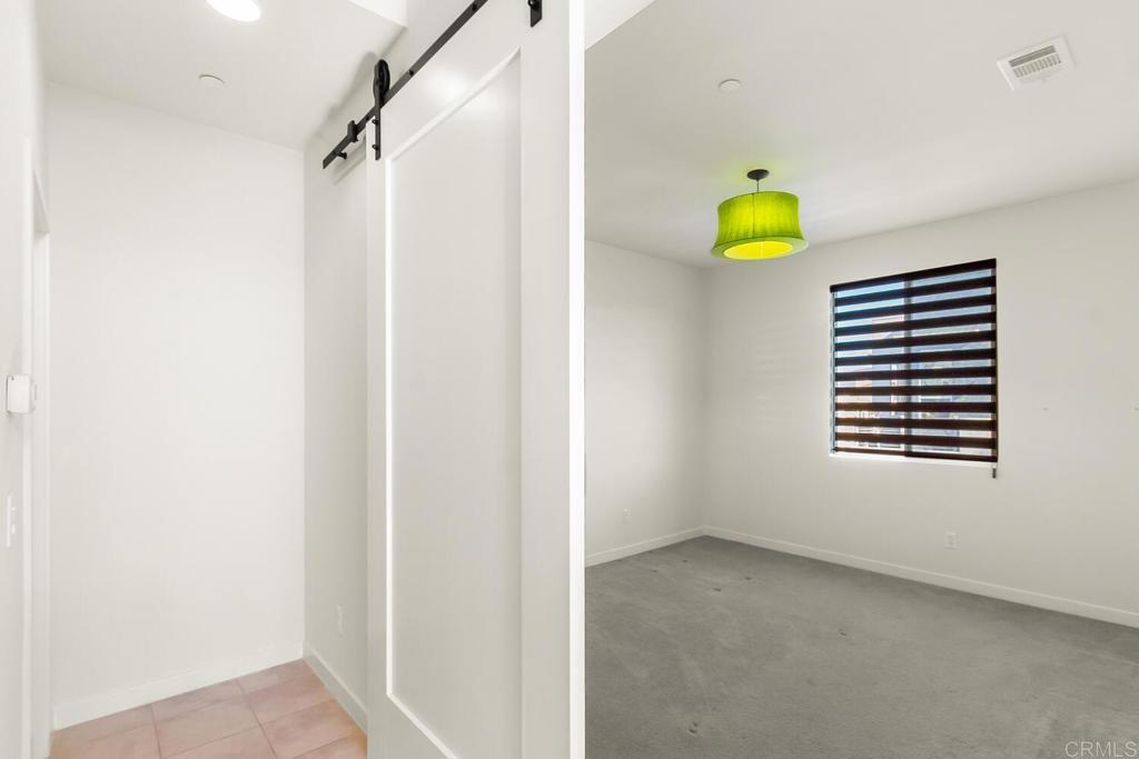 2012 Foxtrot Loop, Unit 3 Chula Vista, CA 91915 - Photo 21 of 34 a view of a kitchen with a window