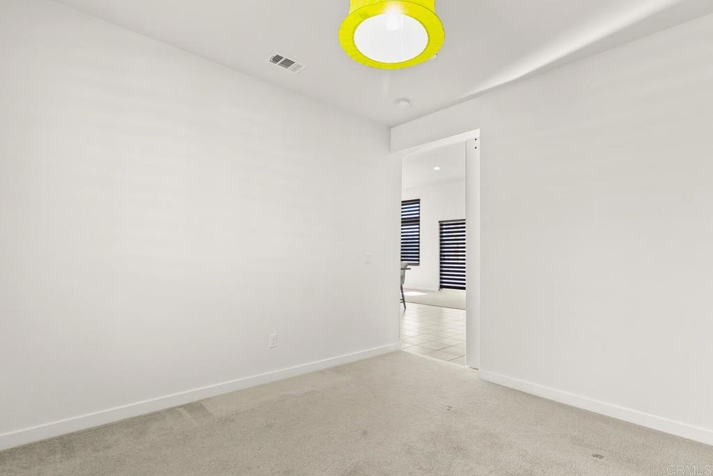 2012 Foxtrot Loop, Unit 3 Chula Vista, CA 91915 - Photo 22 of 34 an empty room with a stove