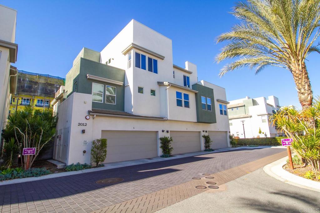 2012 Foxtrot Loop, Unit 3 Chula Vista, CA 91915 - Photo 27 of 34 a front view of a house with a yard
