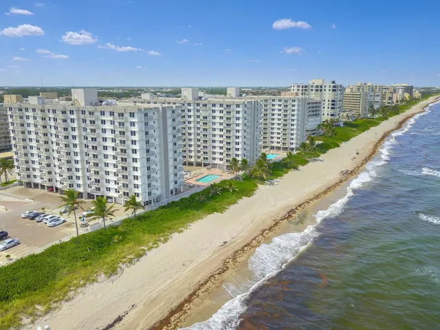 a view of a balcony with an ocean view