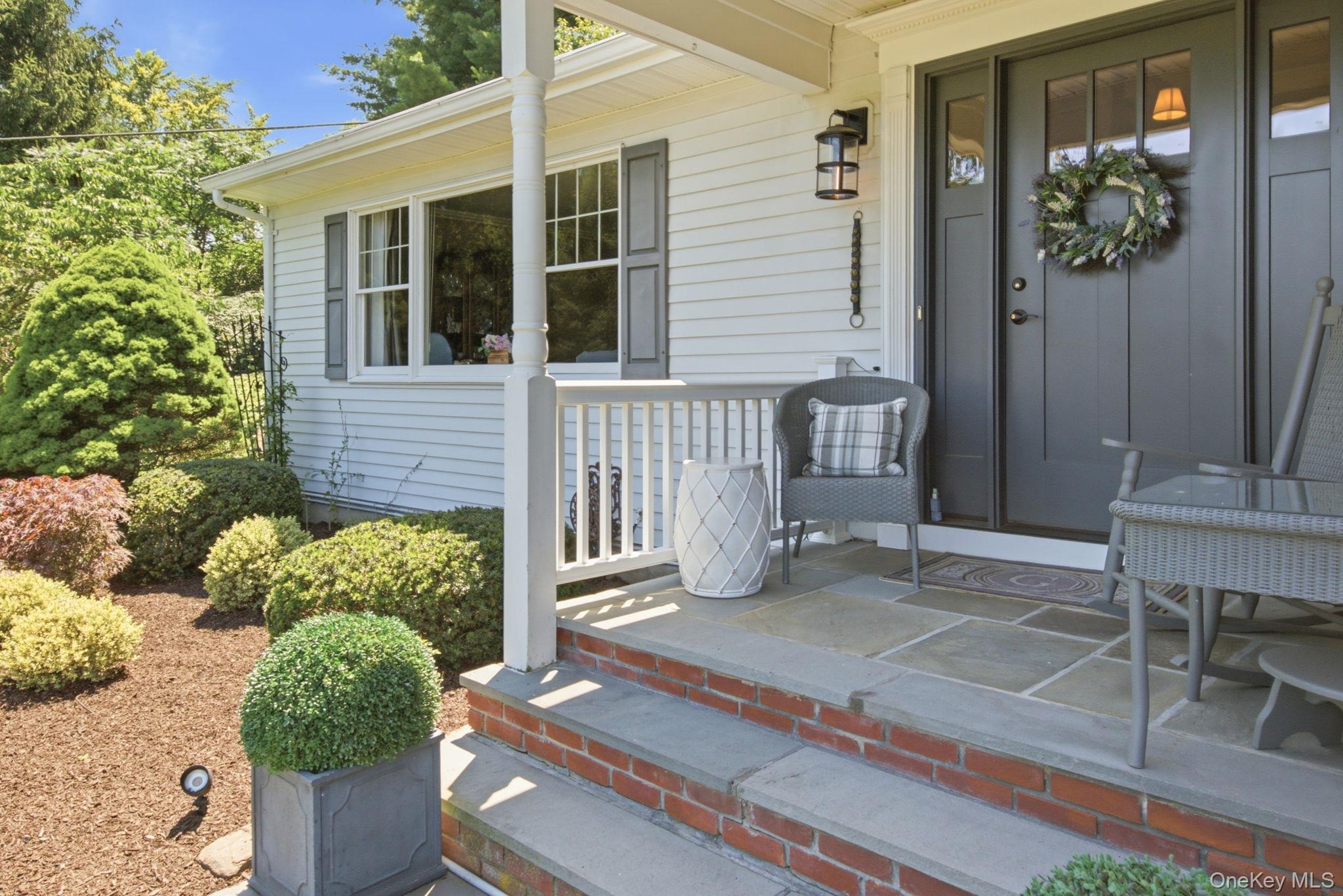 32 Bedell Road Katonah, NY 10536 - Photo 41 of 49 The covered front porch overlooks the front yard.