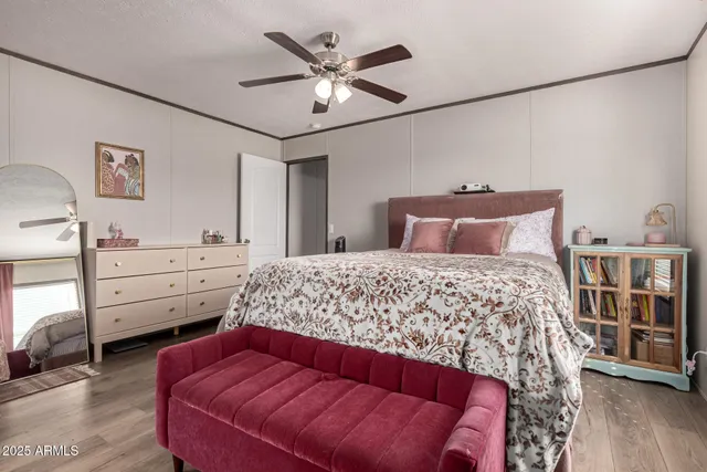 a bedroom with a bed and a cabinets