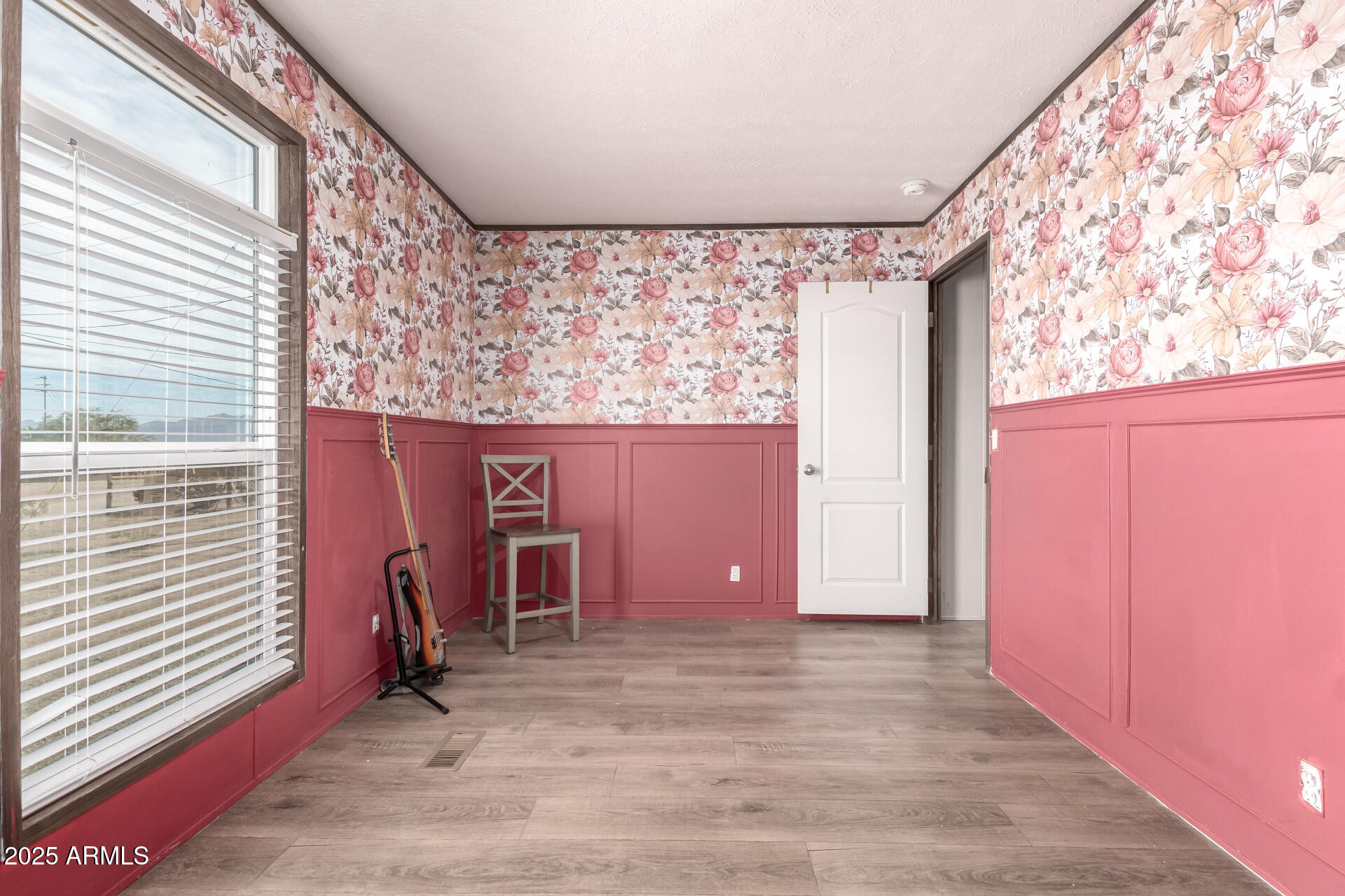 18709 West Riggs Road Buckeye, AZ 85326 - Photo 21 of 29 a view of a livingroom with a furniture and a window