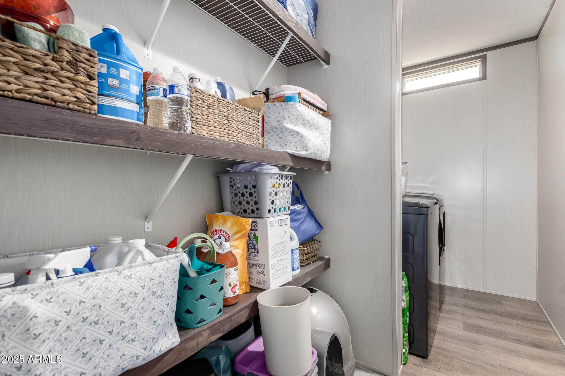 18709 West Riggs Road Buckeye, AZ 85326 - Photo 22 of 29 a living room with furniture and a window