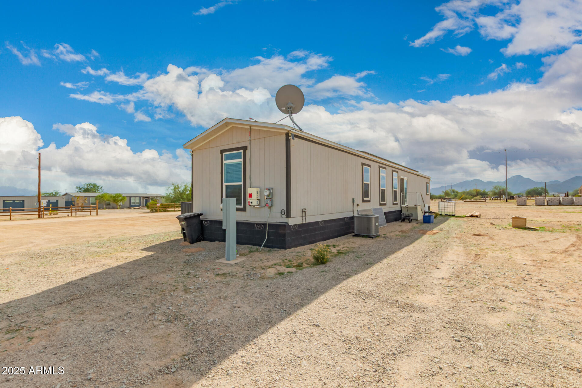 18709 West Riggs Road Buckeye, AZ 85326 - Photo 24 of 29 a view of a street with a building in the background