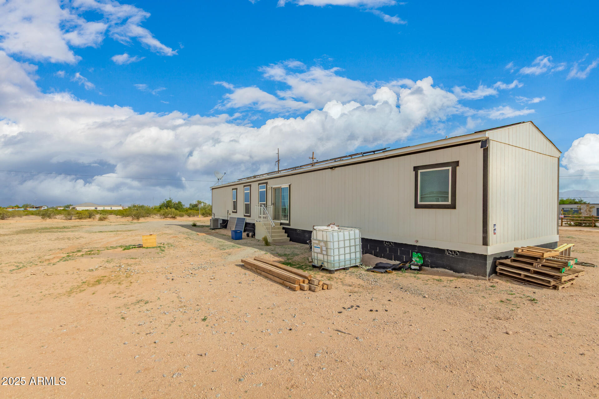 18709 West Riggs Road Buckeye, AZ 85326 - Photo 25 of 29 a view of a terrace with wooden cabinet