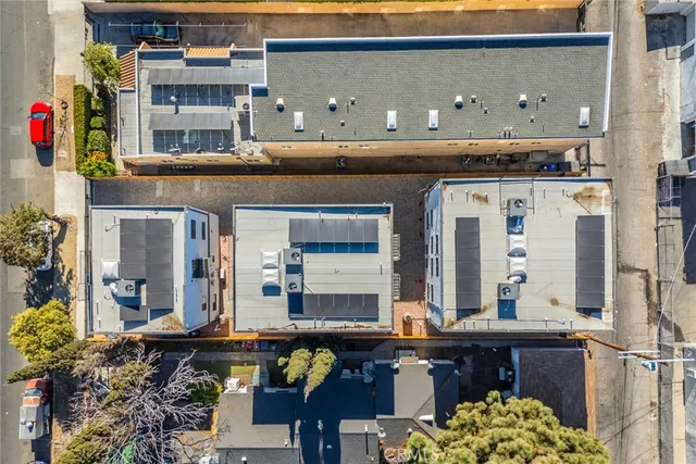 a living room with lots of wooden furniture