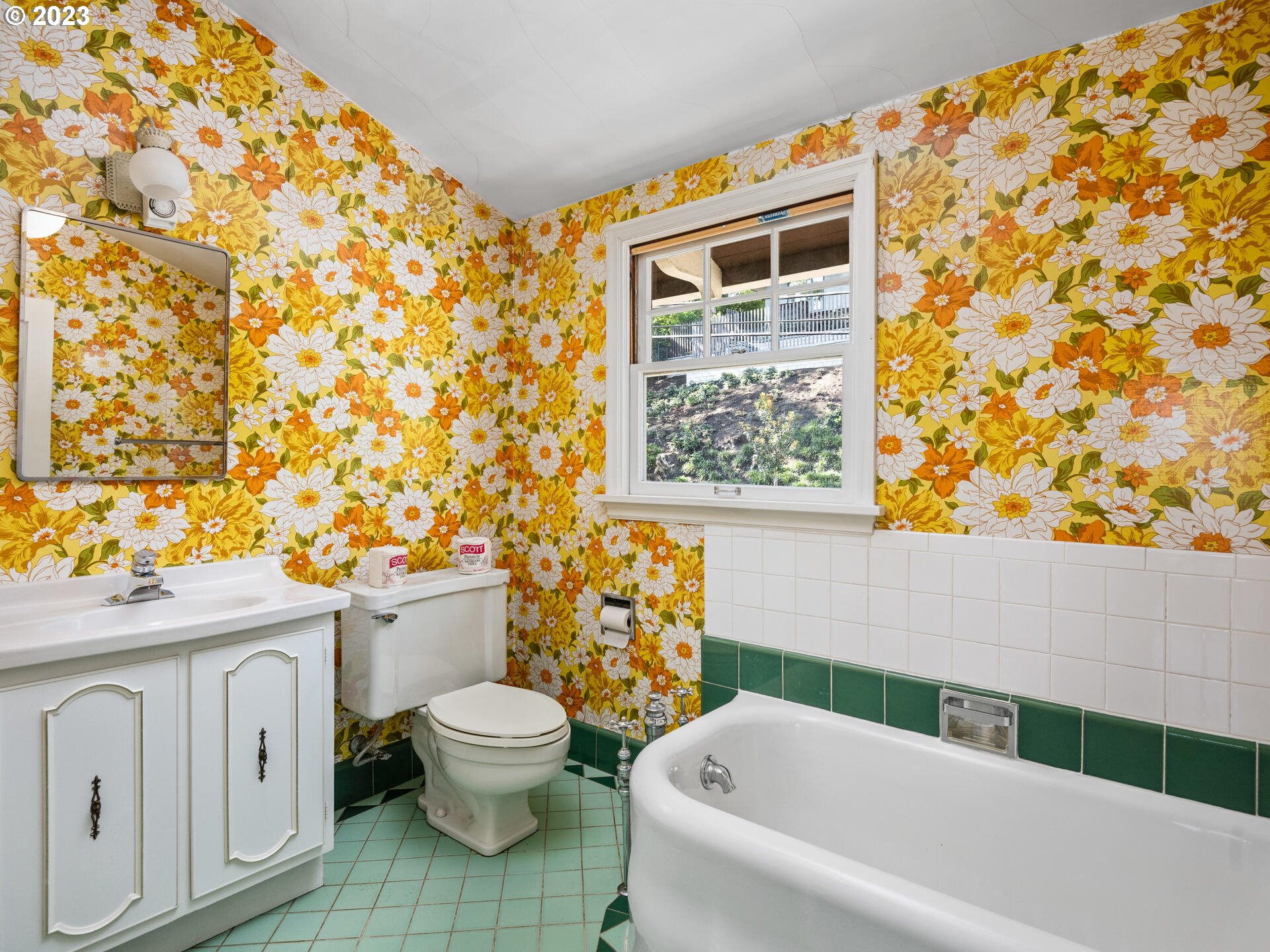 1442 Southwest Vista Avenue Portland, OR 97201 - Photo 32 of 46 a bathroom with a toilet and a shower curtain