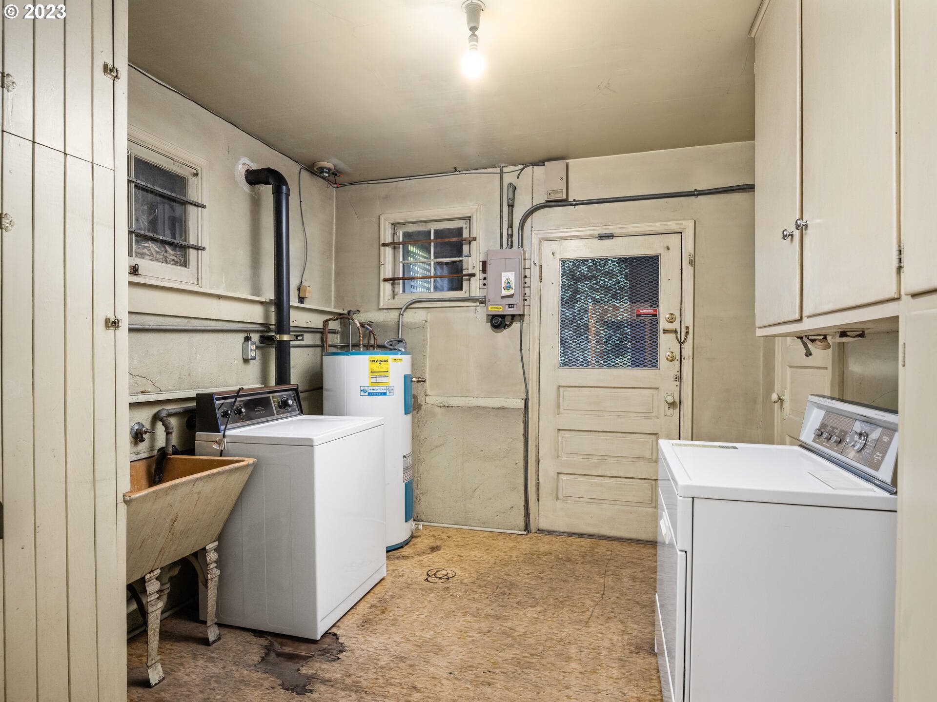 1442 Southwest Vista Avenue Portland, OR 97201 - Photo 35 of 46 a room with storage and utility