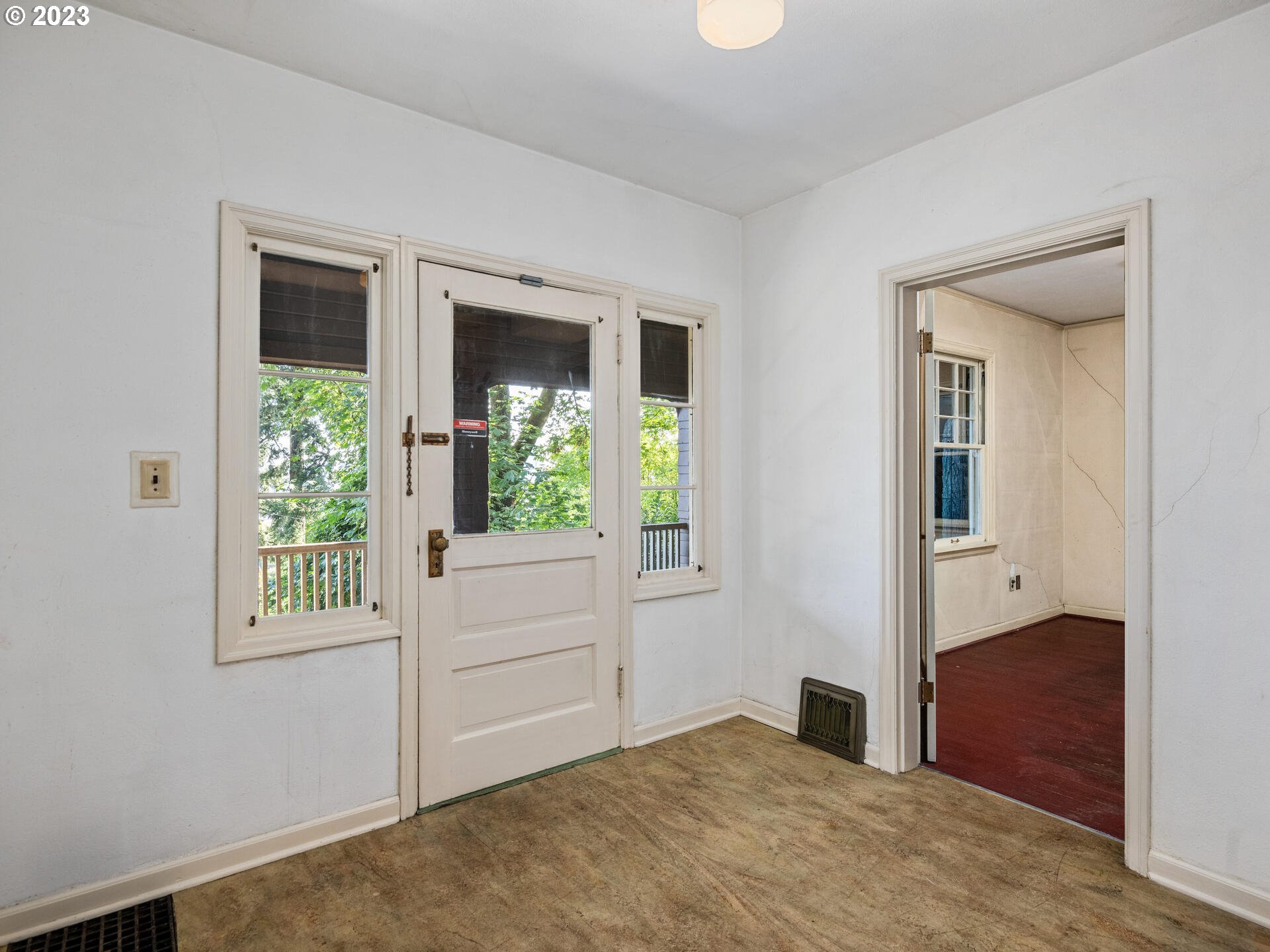 1442 Southwest Vista Avenue Portland, OR 97201 - Photo 38 of 46 a view of an entryway with wooden floor and a livingroom