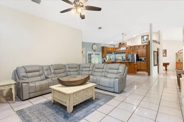 a kitchen with stainless steel appliances granite countertop a stove and a sink