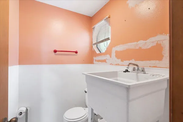 a view of a chairs and table in a patio