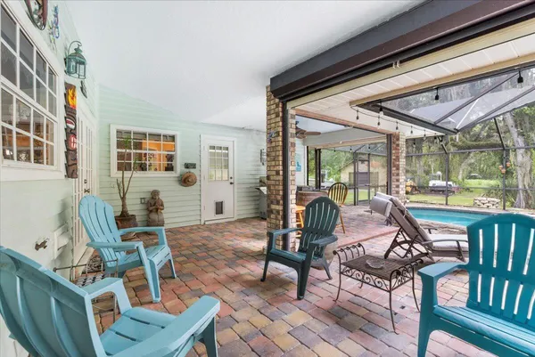 a view of a park with large trees