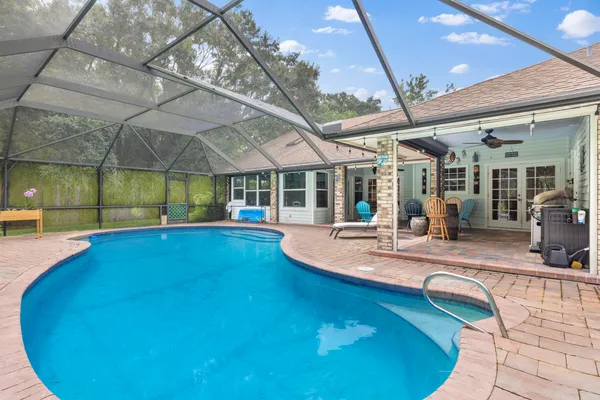 a view of a backyard of a house