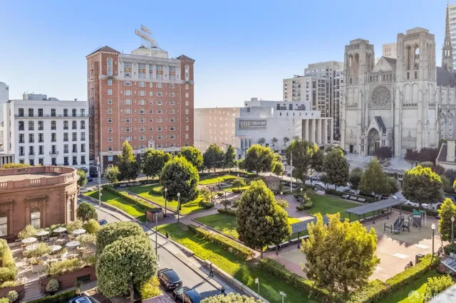 a view of a city with tall buildings