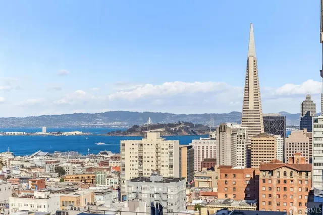 a view of city with a lake