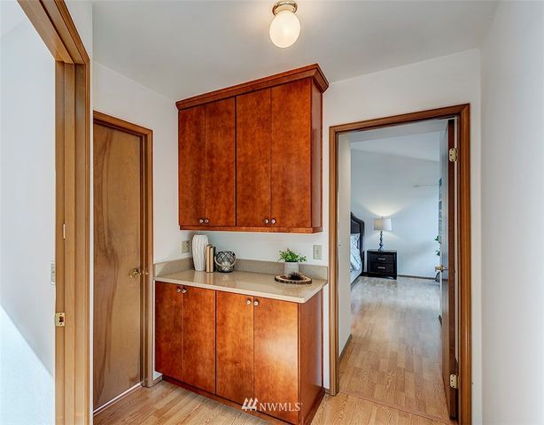 a view of a bathroom with sink and mirror