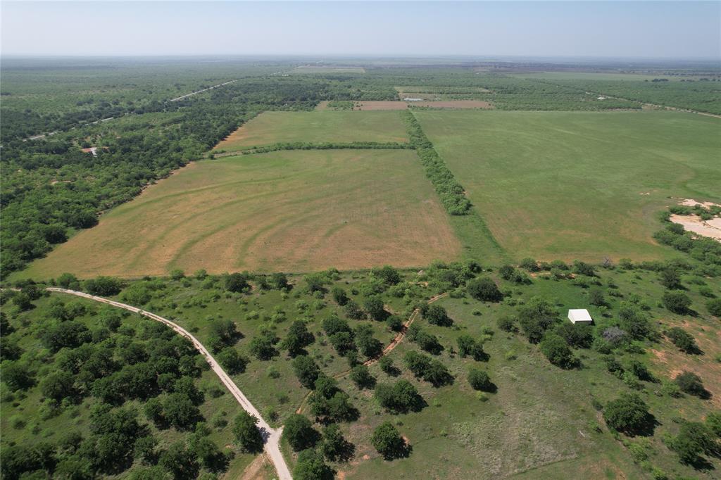 628 Robinson Road Graham, TX 76450 - Photo 11 of 18 a view of a lake with a yard