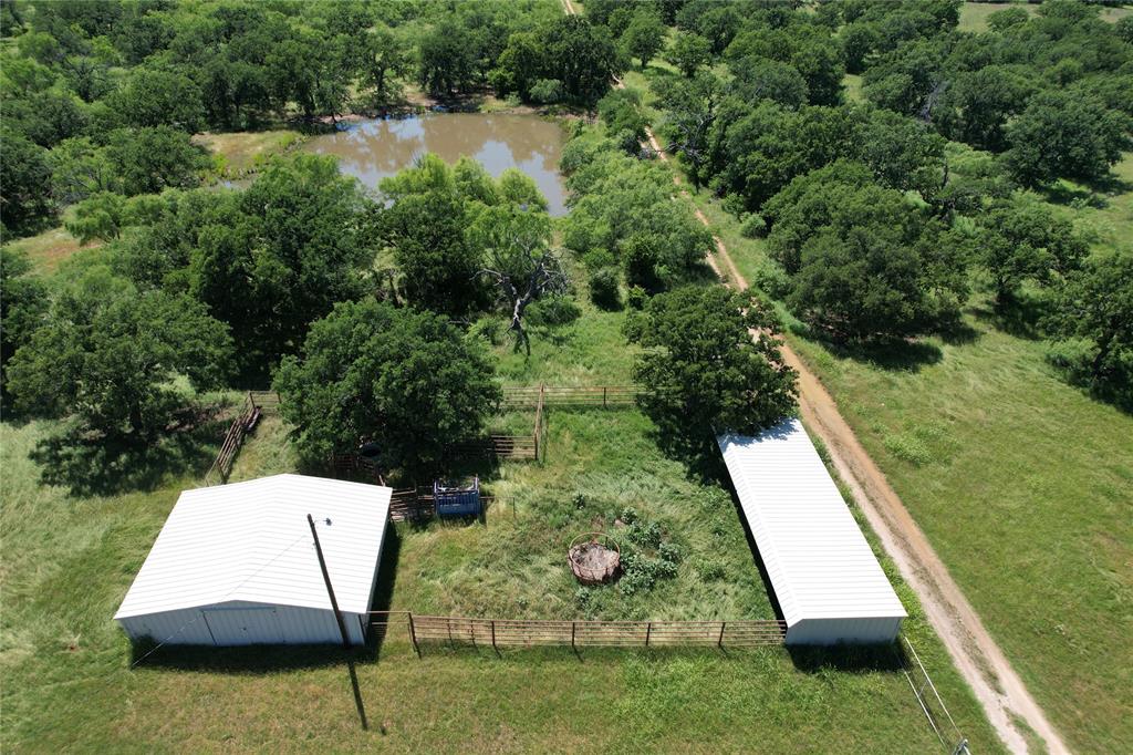 628 Robinson Road Graham, TX 76450 - Photo 15 of 18 an aerial view of a house with a yard and lake view