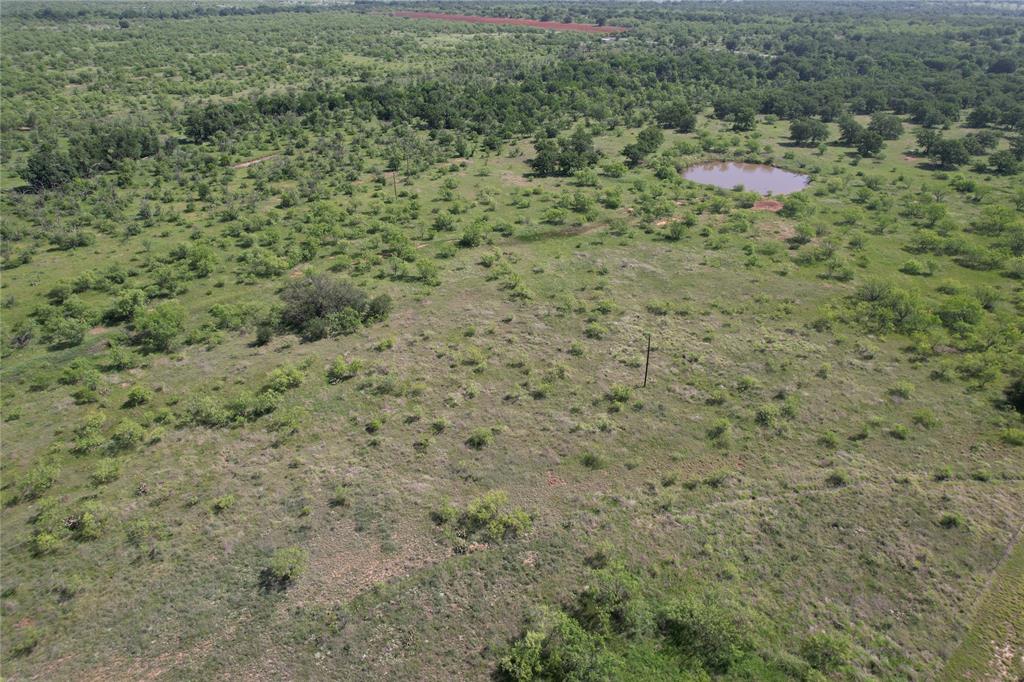 628 Robinson Road Graham, TX 76450 - Photo 7 of 18 a view of a dry yard with a small yard and covered with green space