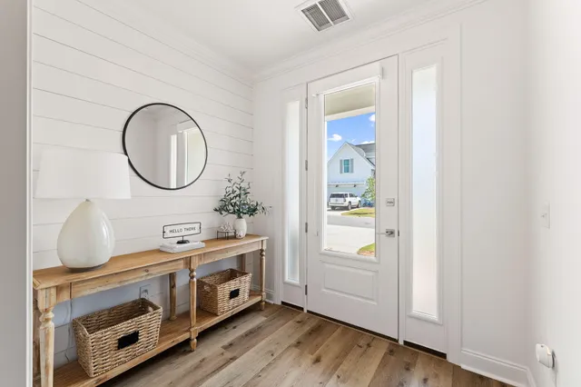 a view of a bathroom from a hallway