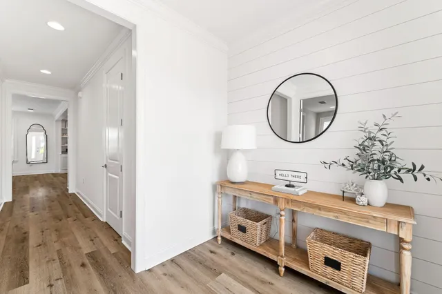 a bathroom with double vanity a two sinks and a mirror