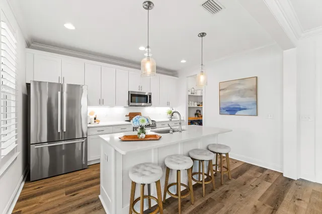 a outdoor living space with furniture and a flat screen tv