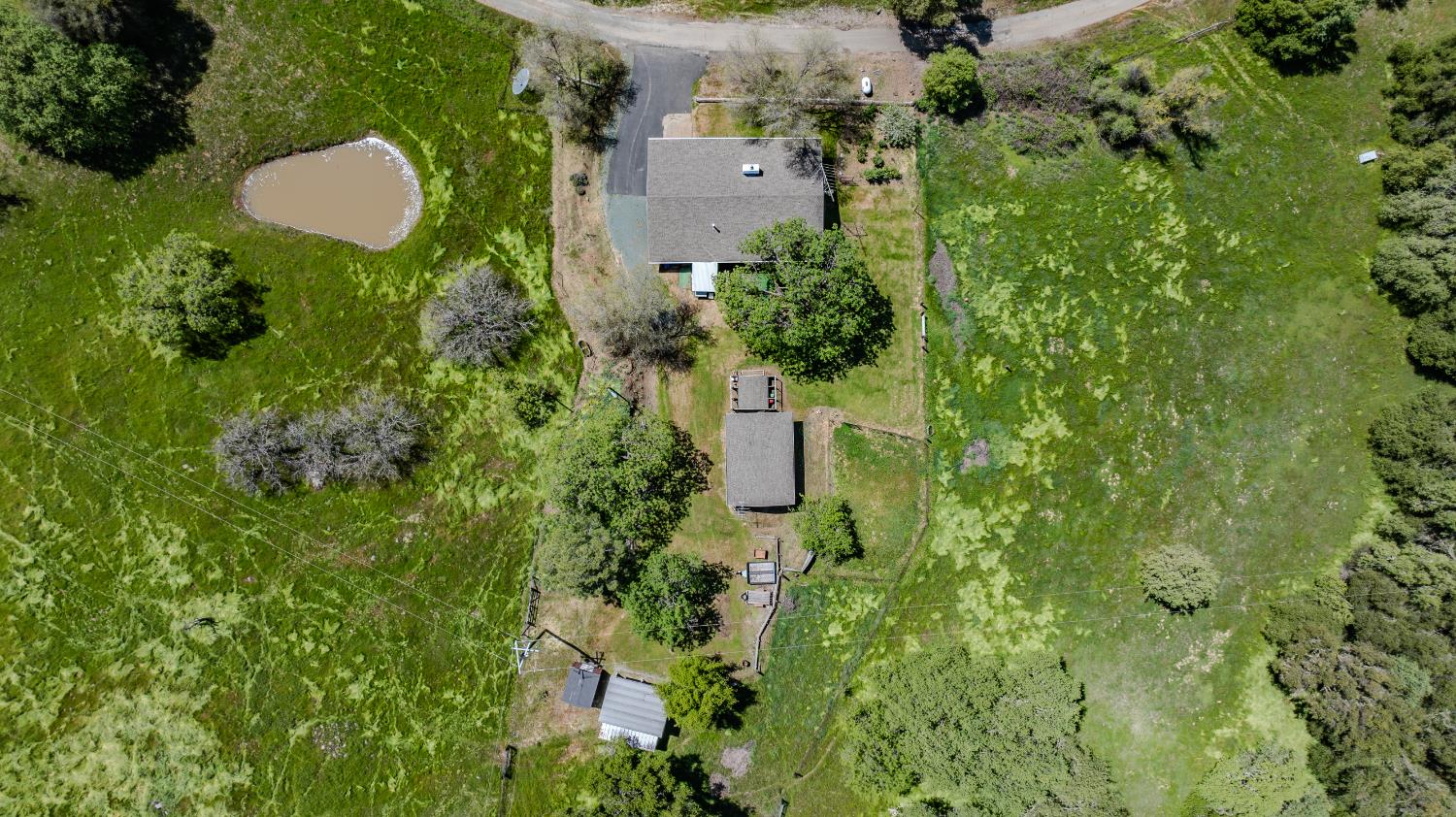19160 American Flat Road Fiddletown, CA 95629 - Photo 2 of 66 Aerial view of house and seasonal pond