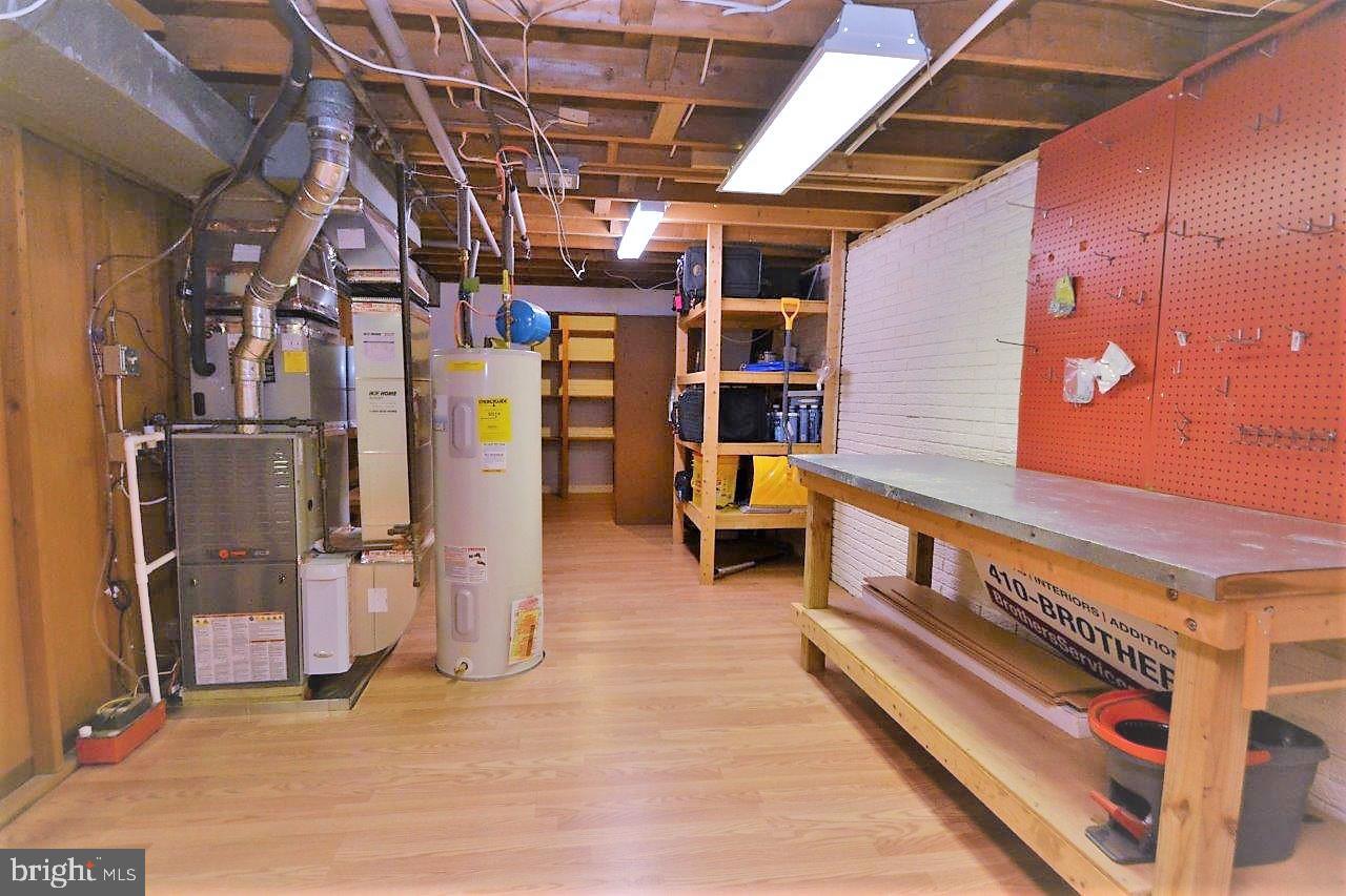 223 Candytuft Road Reisterstown, MD 21136 - Photo 22 of 30 extra large storage area with workbench new HVAC
