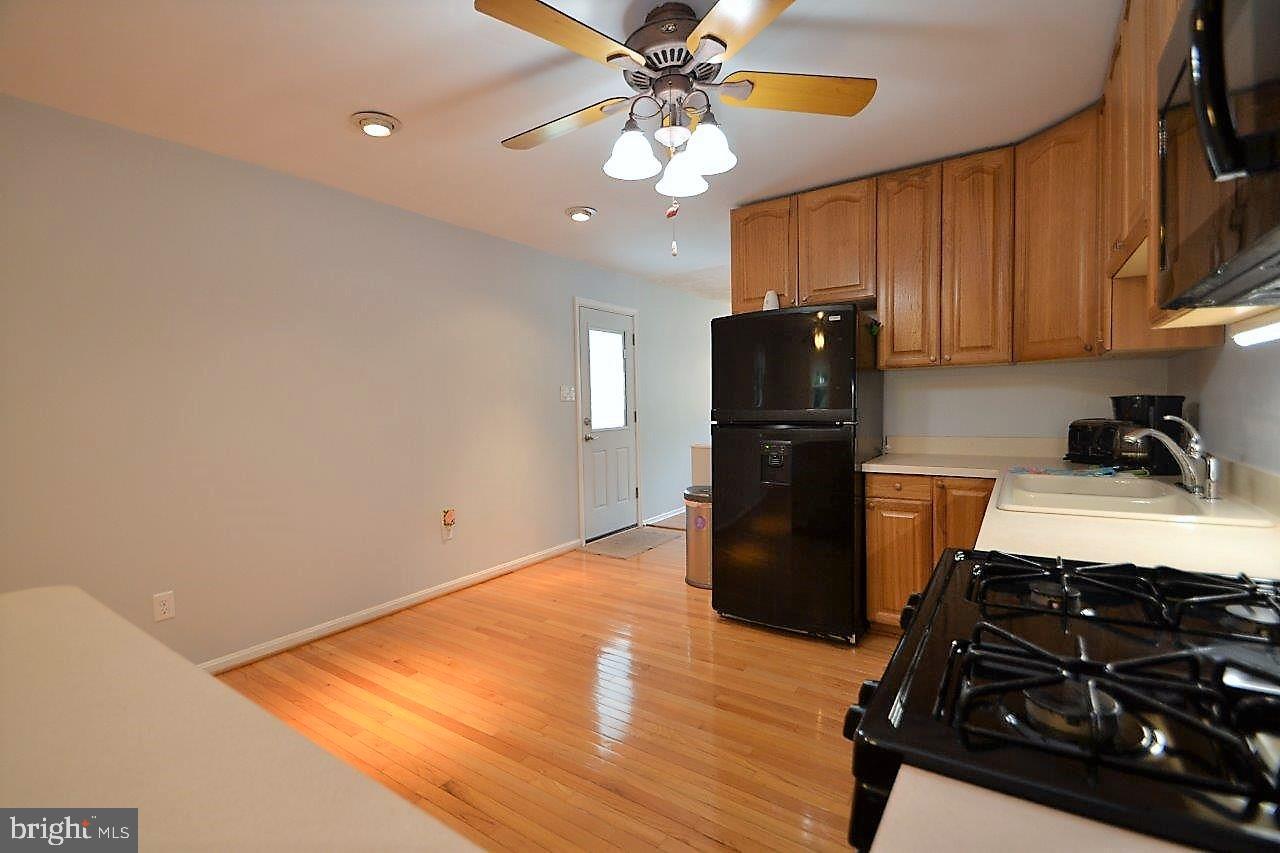 223 Candytuft Road Reisterstown, MD 21136 - Photo 9 of 30 Kitchen with new paint, flooring and appliances