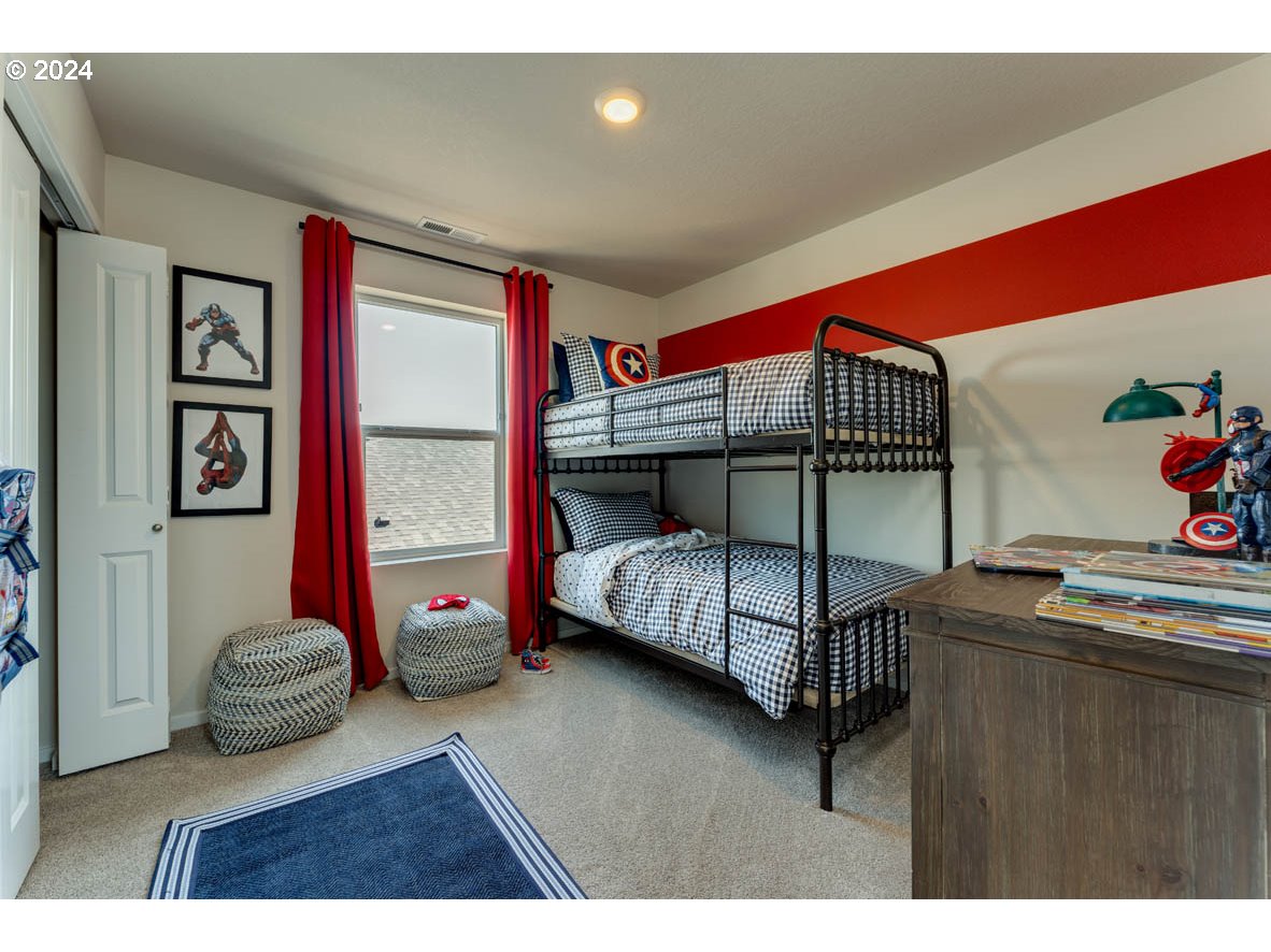 2990 U Street Springfield, OR 97477 - Photo 27 of 36 a bedroom with a bed and a window