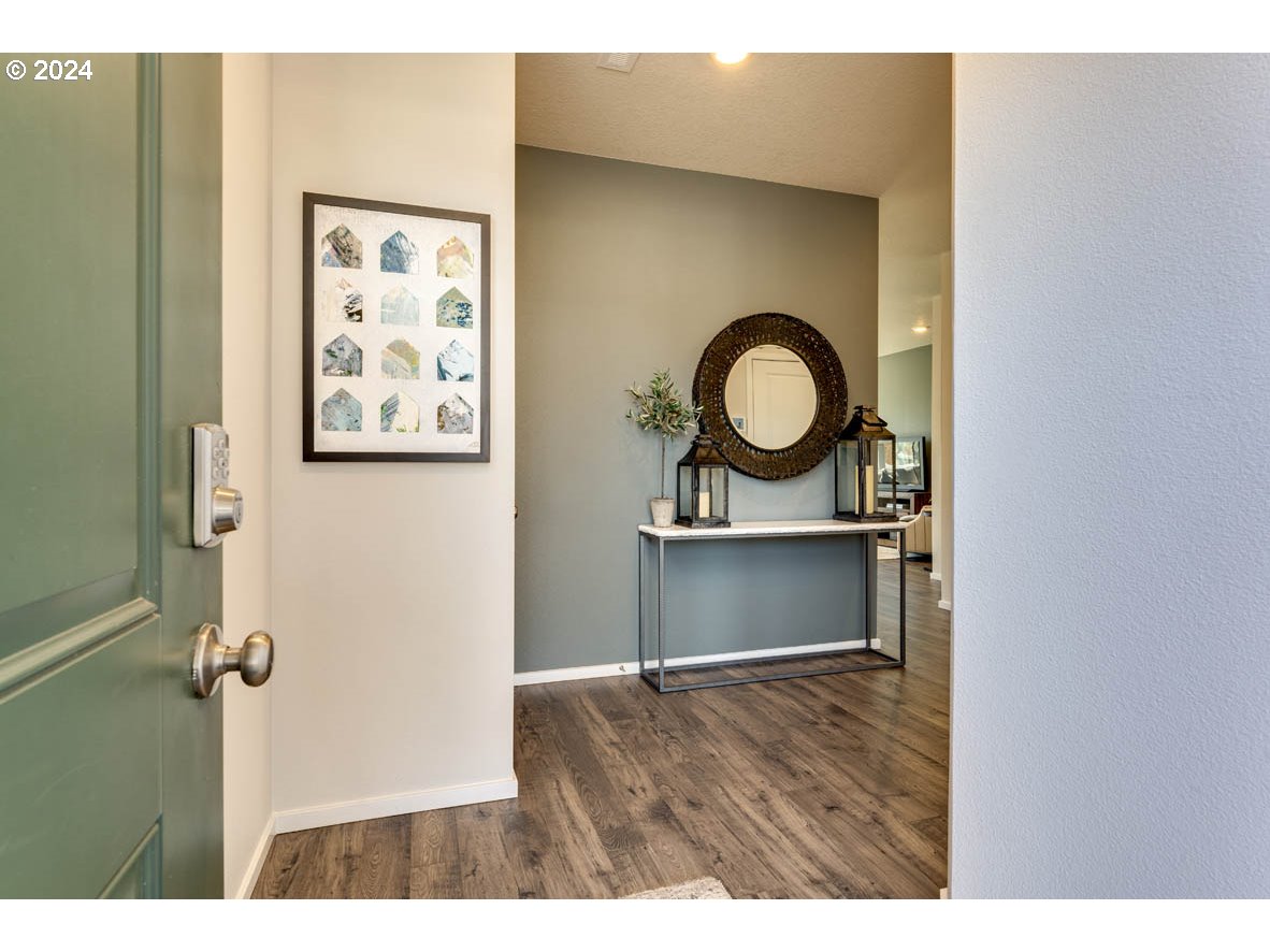 2990 U Street Springfield, OR 97477 - Photo 4 of 36 a view of a room that has a bench in it