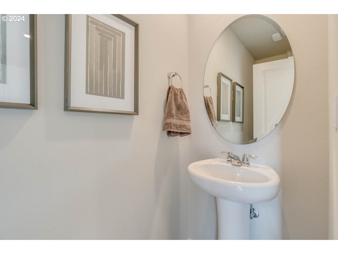 2990 U Street Springfield, OR 97477 - Photo 5 of 36 a bathroom with a sink and a mirror