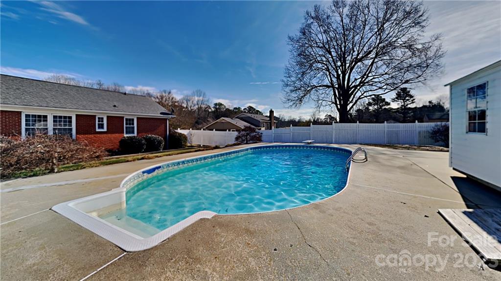 1209 Castlegate Drive Gastonia, NC 28054 - Photo 11 of 13 front view of a house with a yard