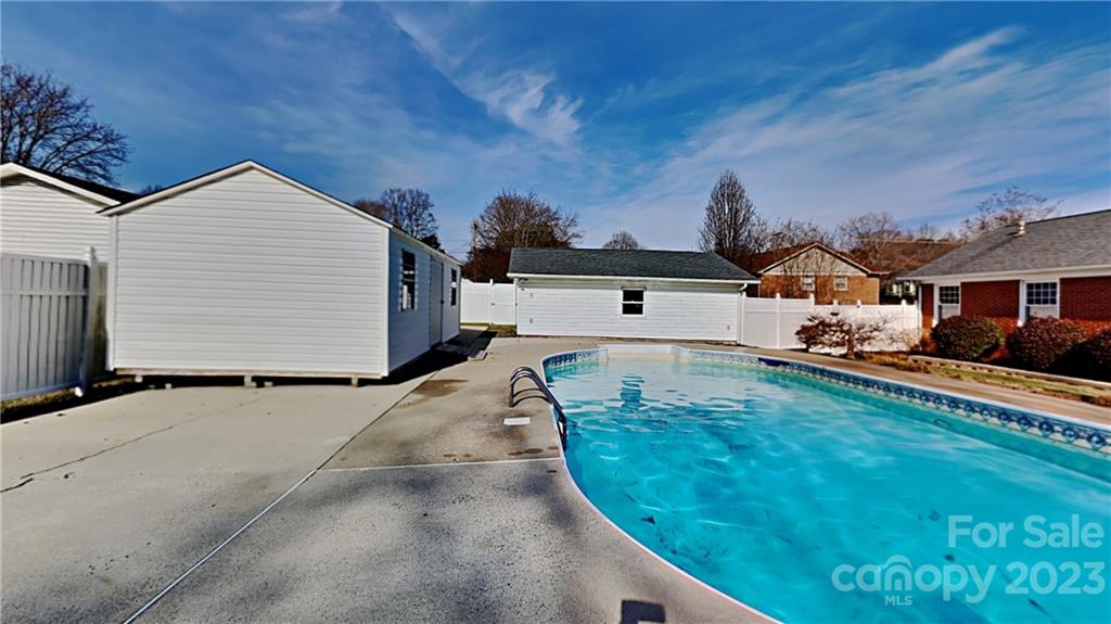 1209 Castlegate Drive Gastonia, NC 28054 - Photo 12 of 13 a view of a house with a backyard