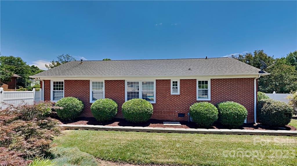 1209 Castlegate Drive Gastonia, NC 28054 - Photo 13 of 13 a front view of a house with a yard and garage