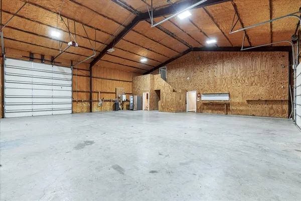 a view of empty room with stairs
