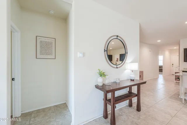 a workspace with furniture and mirror