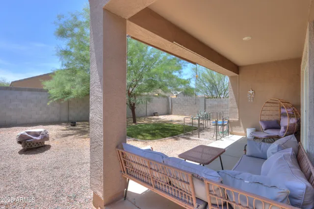 a outdoor space with the couches and dining room view
